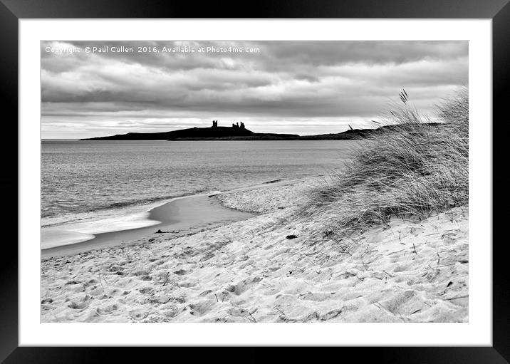 Dunstanburgh castle from Embleton beach. Framed Mounted Print by Paul Cullen