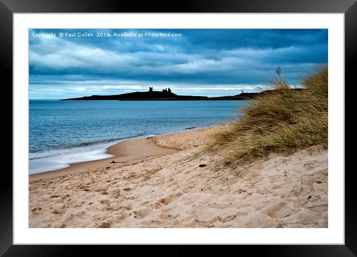 Dunstanburgh castle from Embleton beach. Framed Mounted Print by Paul Cullen