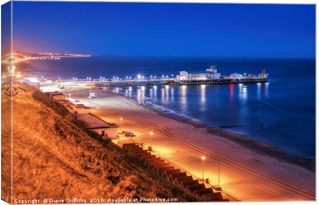 Bournemouth Pier at Night Canvas Print by Diane Griffiths