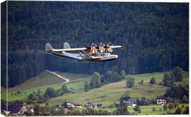 Flying In The Alps Canvas Print by Rick Penrose