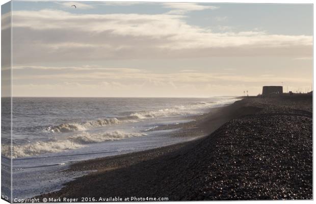 Waves on Aldeburgh beach with martello tower in ba Canvas Print by Mark Roper