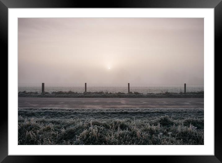 Sunrise through fog on a frosty morning. Norfolk,  Framed Mounted Print by Liam Grant