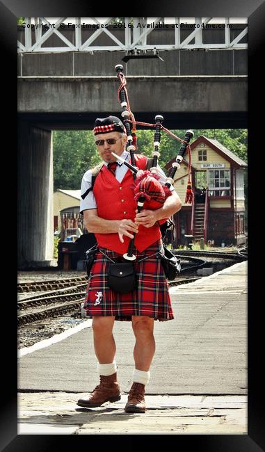 Lone bagpiper Framed Print by Derrick Fox Lomax