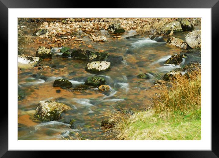 WATER ROUND STONES Framed Mounted Print by andrew saxton