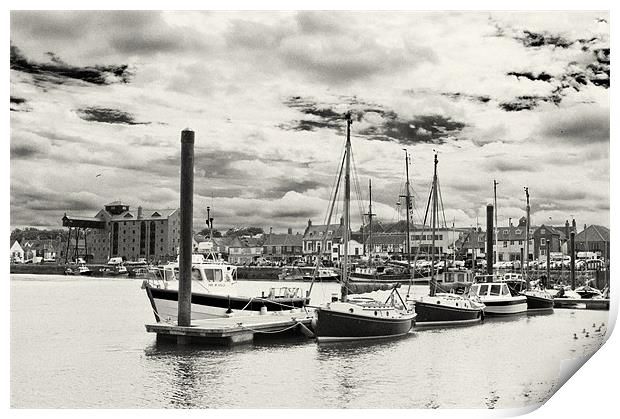 Boats moored in Wells Harbour Print by Stephen Mole