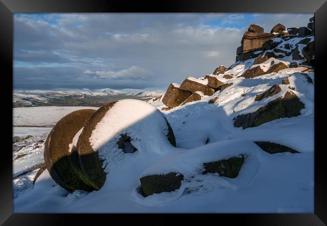 Stanage Edge Snowy Millstones Framed Print by James Grant