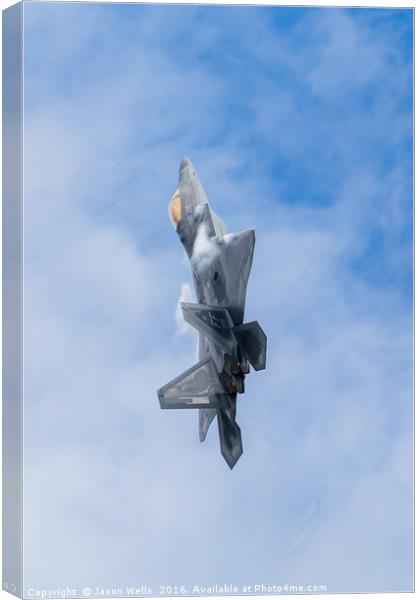 F-22A Raptor climbs into the sky Canvas Print by Jason Wells