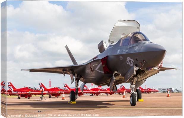 F-35 Lightning II in front of the Red Arrows Canvas Print by Jason Wells
