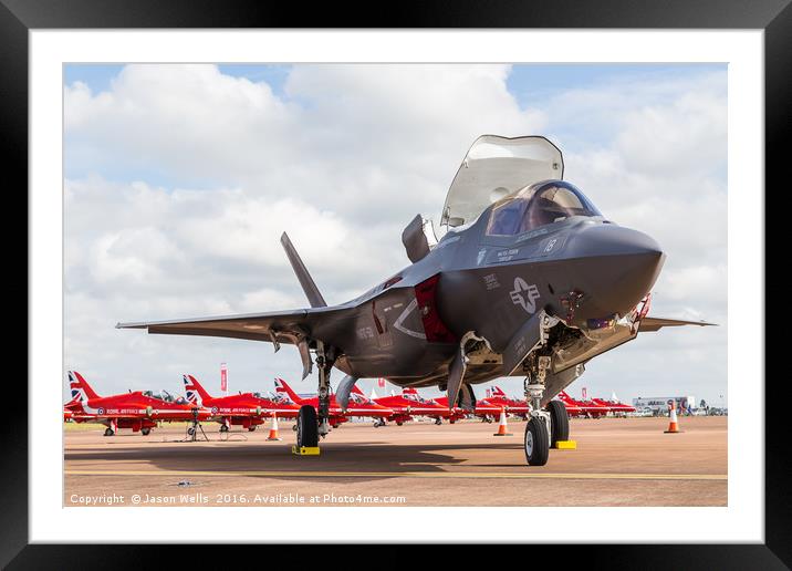 F-35 Lightning II in front of the Red Arrows Framed Mounted Print by Jason Wells