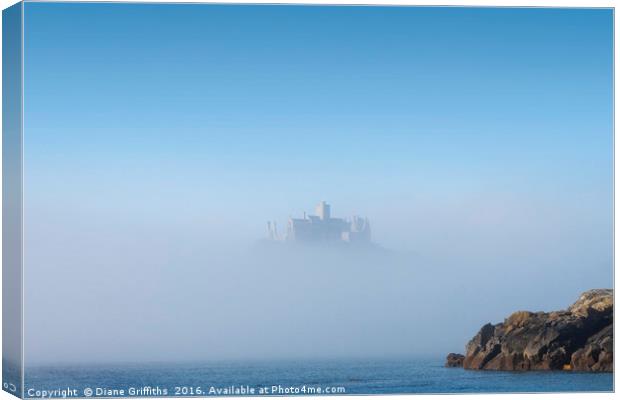 St Michael's Mount covered in mist Canvas Print by Diane Griffiths