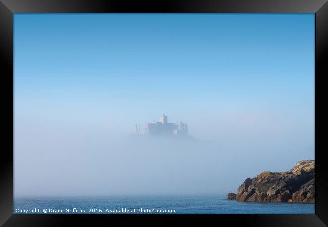 St Michael's Mount covered in mist Framed Print by Diane Griffiths