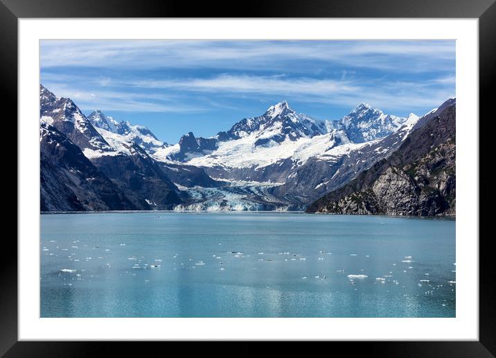Alaskan glacier during summer time flowing into ba Framed Mounted Print by Thomas Baker