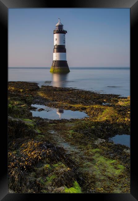 Penmon Lighthouse Reflection Framed Print by Eric Pearce AWPF