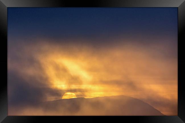 Sun setting behind Wetherlam Lake Distict Cumbria Framed Print by Nick Jenkins