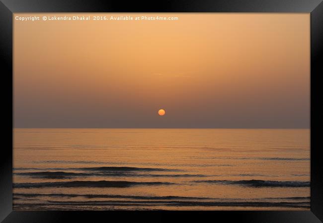 Sea and sun  Framed Print by Lokendra Dhakal