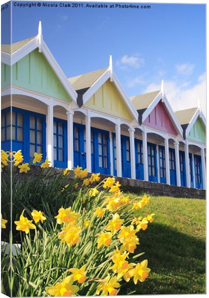 Beach Huts in Spring Canvas Print by Nicola Clark