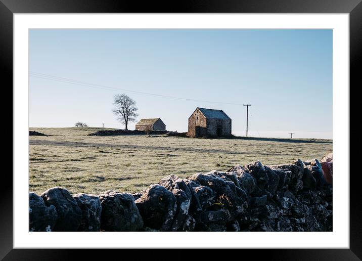 Stone barn in a field on a frosty morning. Derbysh Framed Mounted Print by Liam Grant