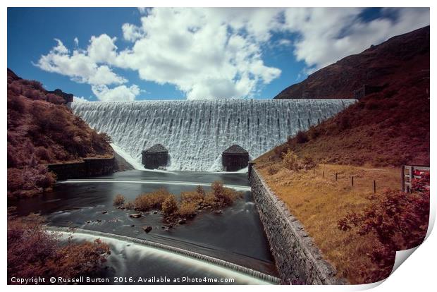 Caban Coch dam in full flow Print by Russell Burton