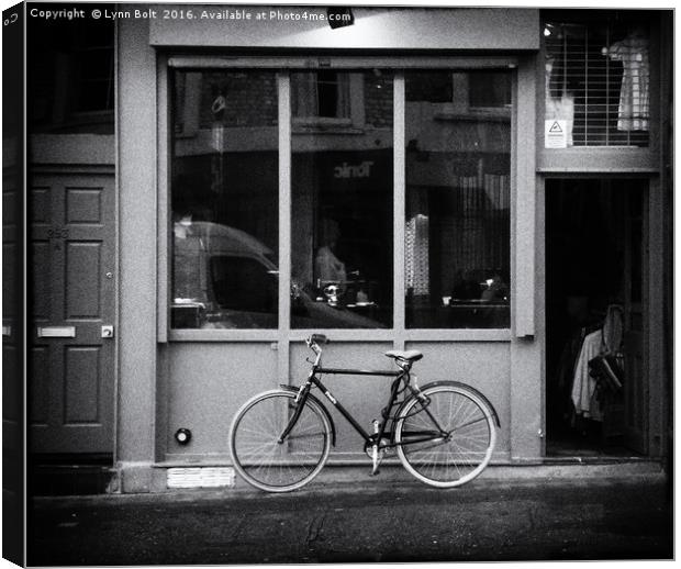 Shop Front with Bicycle Canvas Print by Lynn Bolt