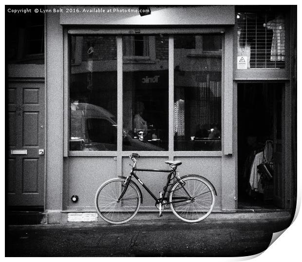 Shop Front with Bicycle Print by Lynn Bolt