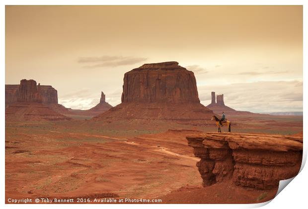 Lone Horseman Overlooks Monument Valley Print by Toby Bennett
