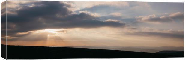 Sunset through storm clouds. Beeley Moor, Derbyshi Canvas Print by Liam Grant