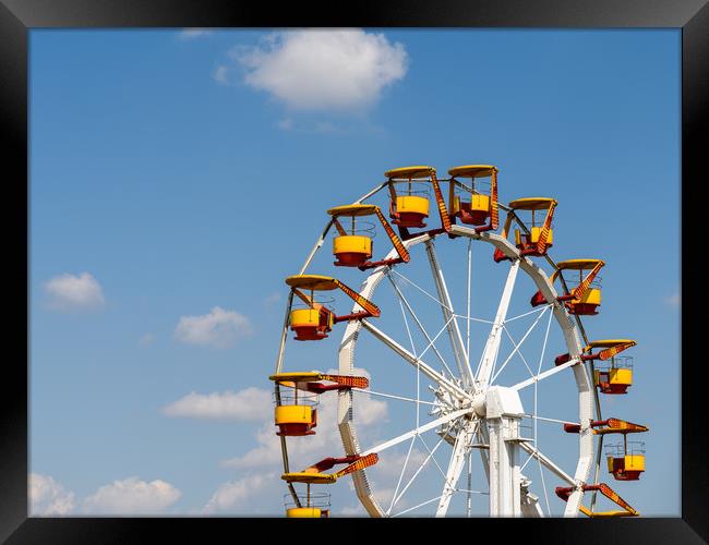 Giant Ferris Wheel In Fun Park On Blue Sky Framed Print by Radu Bercan