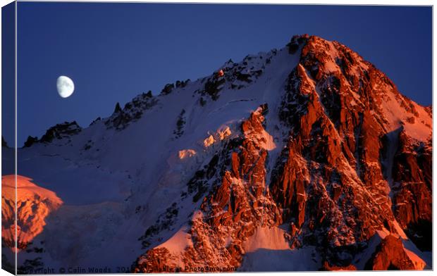 Moonrise and sunset on the Aiguille de Chardonnet Canvas Print by Colin Woods