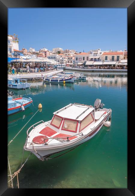 Agios Nikolaos Boat in Lagoon Framed Print by Antony McAulay