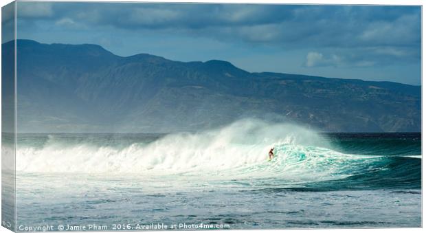 Surfers at the famous Hookipa Beach in the North s Canvas Print by Jamie Pham