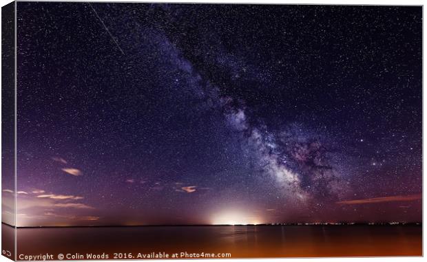 Milky Way over the Sea Canvas Print by Colin Woods