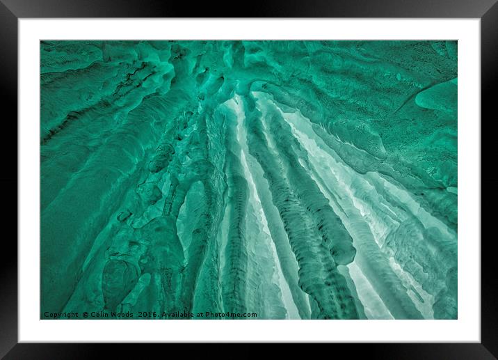 Looking up at gorgeous green icicles Framed Mounted Print by Colin Woods