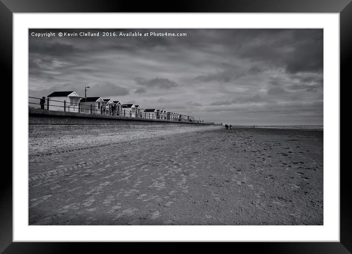 Huts to rent Framed Mounted Print by Kevin Clelland