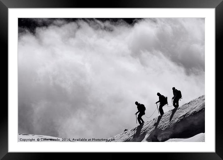 Climbers descending into the clouds Framed Mounted Print by Colin Woods