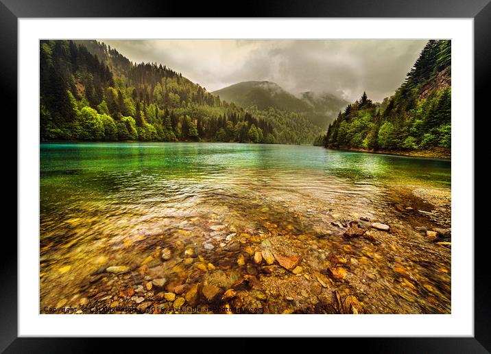 Lake in mountains, in a rainy day Framed Mounted Print by Ragnar Lothbrok