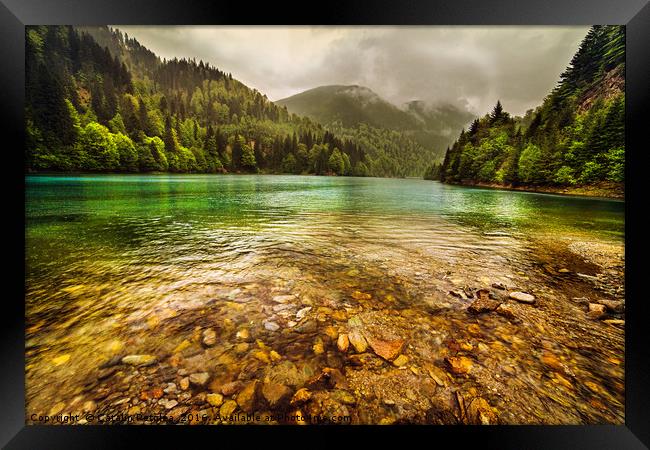 Lake in mountains, in a rainy day Framed Print by Ragnar Lothbrok