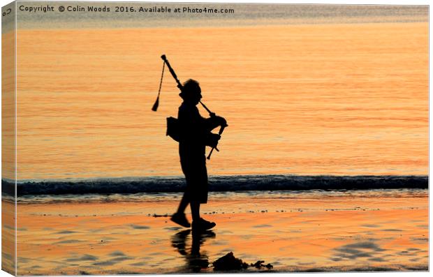 Piper on the beach at Arisaig, Scotland Canvas Print by Colin Woods