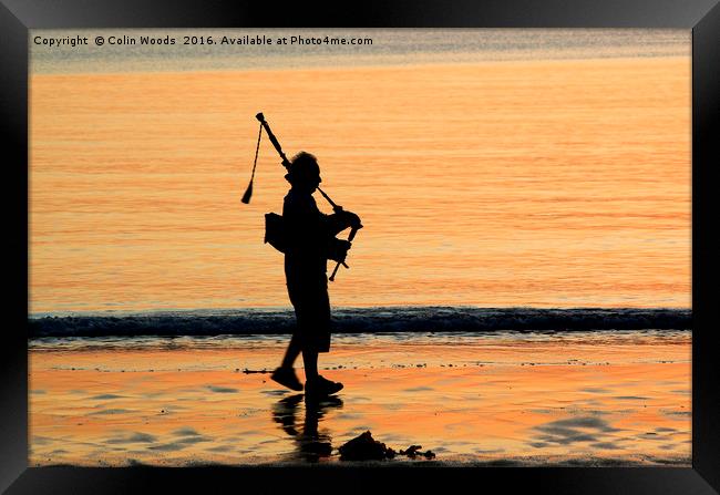 Piper on the beach at Arisaig, Scotland Framed Print by Colin Woods