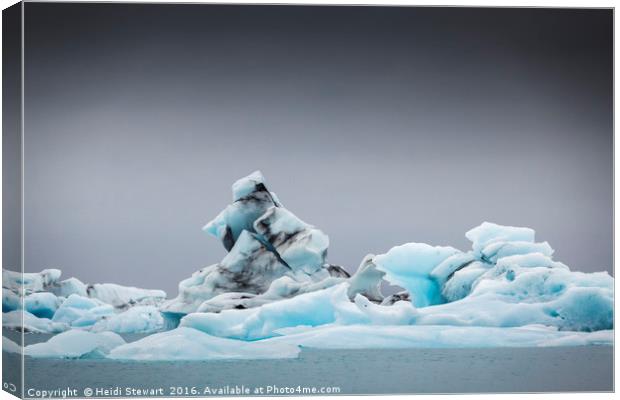 Icebergs at Jokulsarlon Glacial Lake in Iceland Canvas Print by Heidi Stewart