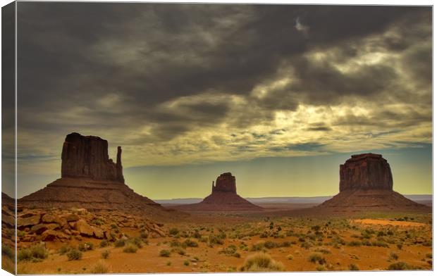 Clouds Over Monument Valley Canvas Print by Matt Johnston