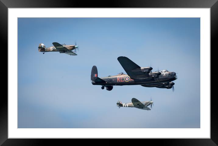 Lancaster bomber in flight Framed Mounted Print by Louise Wilden