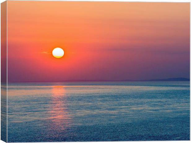 A beautiful Sunset over the Glamorgan Coast Wales Canvas Print by Nick Jenkins