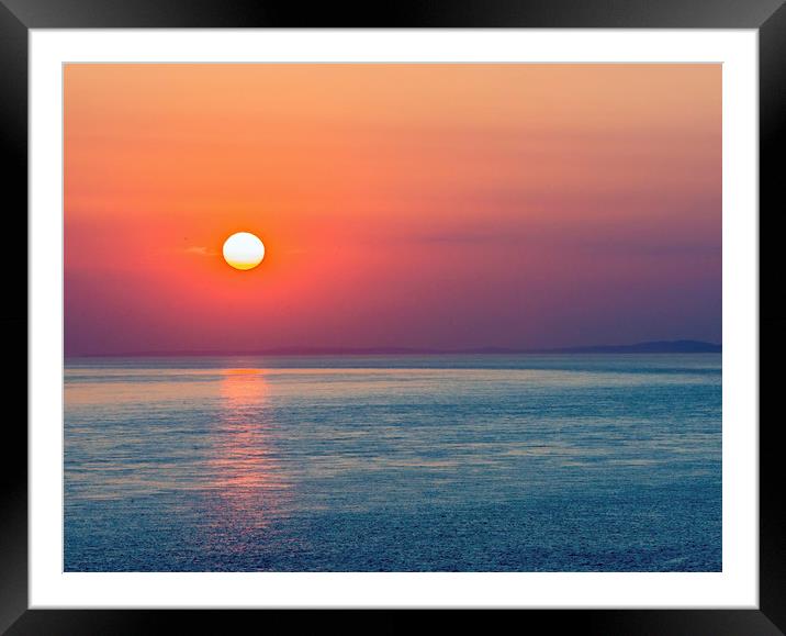 A beautiful Sunset over the Glamorgan Coast Wales Framed Mounted Print by Nick Jenkins
