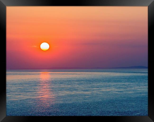 A beautiful Sunset over the Glamorgan Coast Wales Framed Print by Nick Jenkins