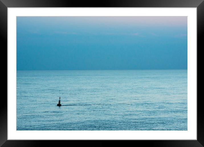 Buoy out to sea Framed Mounted Print by Nick Jenkins