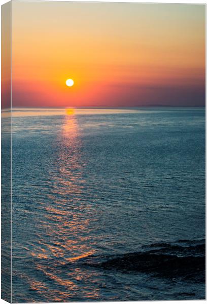 Sunset off Nash Point Canvas Print by Nick Jenkins