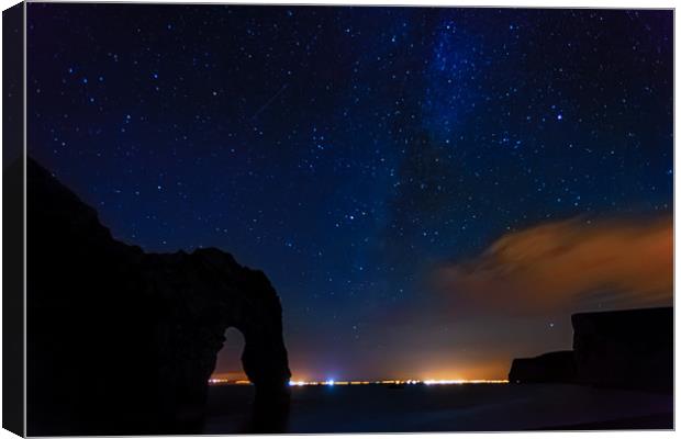 Durdle Door, the Milky way and the meteor Canvas Print by Anthony Simpson