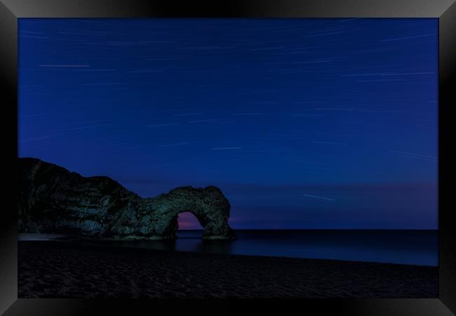 Star Trails above Durdle Door Framed Print by Anthony Simpson