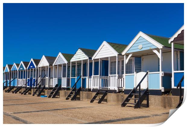 Beach huts in blue and white Print by Kevin Snelling