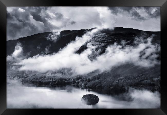 The Lakes in the mist Framed Print by Chris Harris